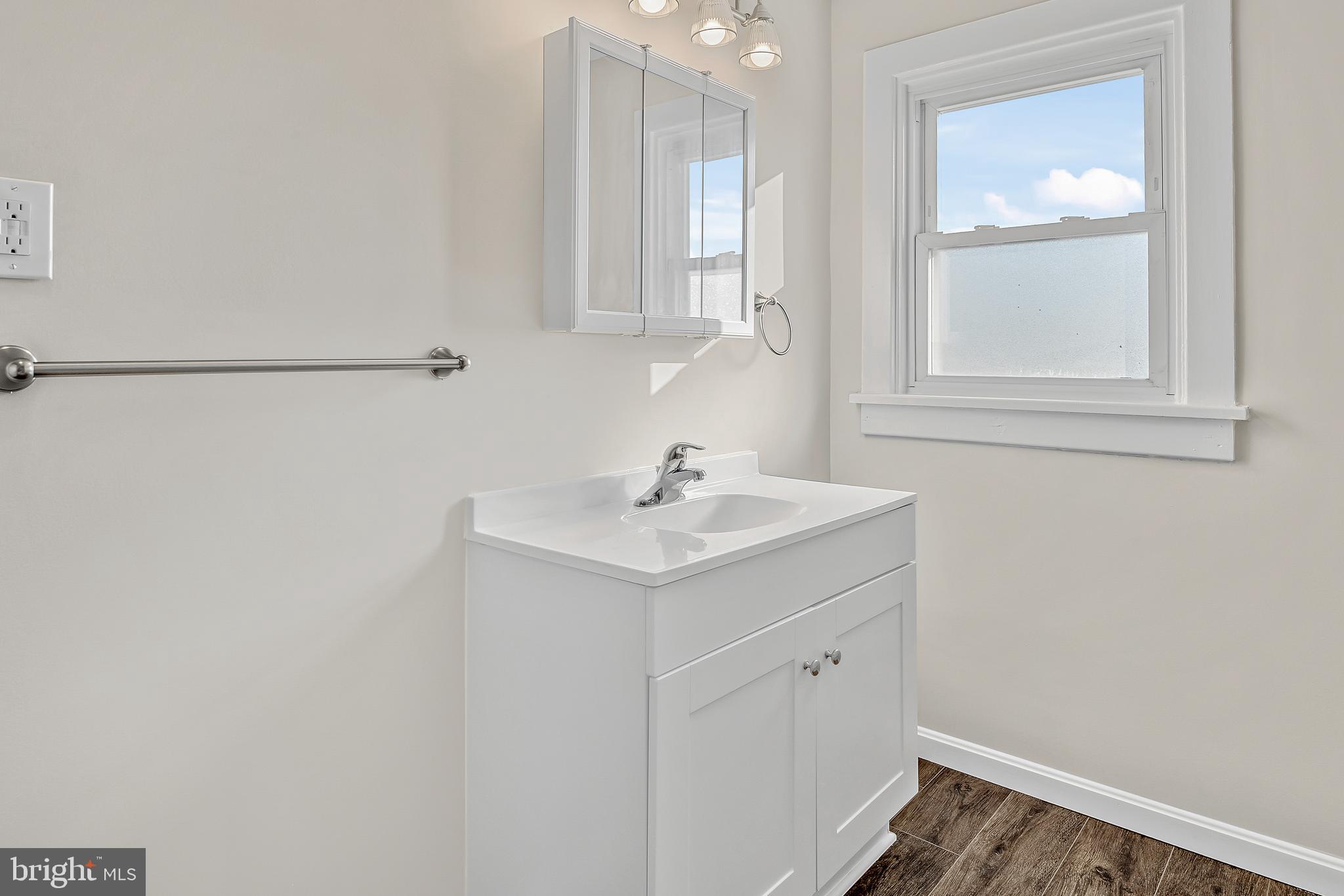 206 Hershey Road Hummelstown, PA 17036 - Photo 18 of 26 a bathroom with a sink and a mirror