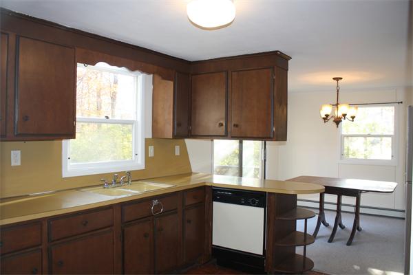 38 Richfield Road Scituate, MA 02066 - Photo 6 of 13 a kitchen with a sink cabinets and window