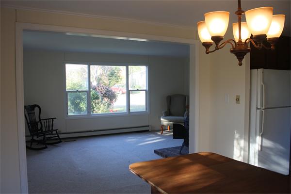 38 Richfield Road Scituate, MA 02066 - Photo 8 of 13 wooden floor in an empty room with a window