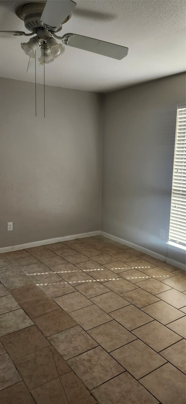 8918 Bissonnet Street, Unit 4 Houston, TX 77074 - Photo 6 of 8 a view of a room with window