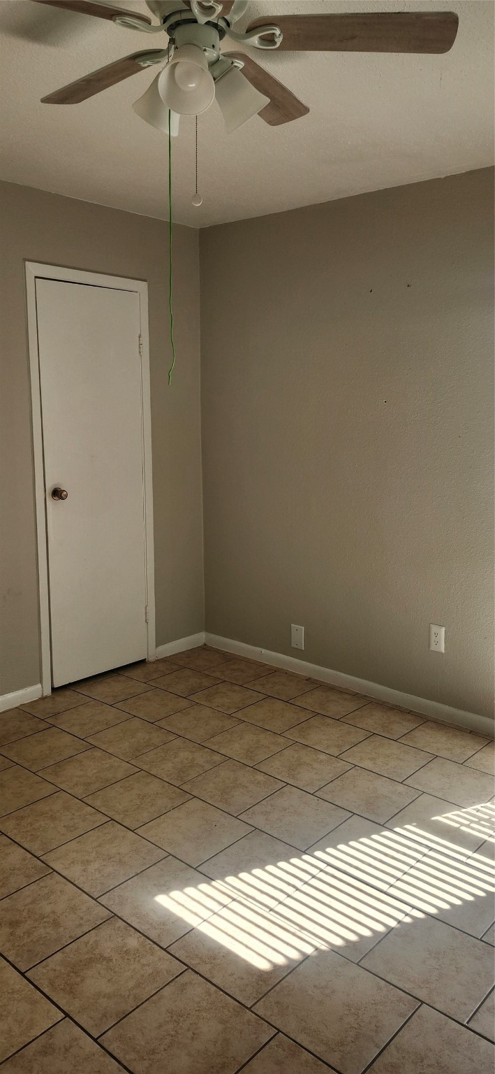 8918 Bissonnet Street, Unit 4 Houston, TX 77074 - Photo 7 of 8 a view of a room with an empty space