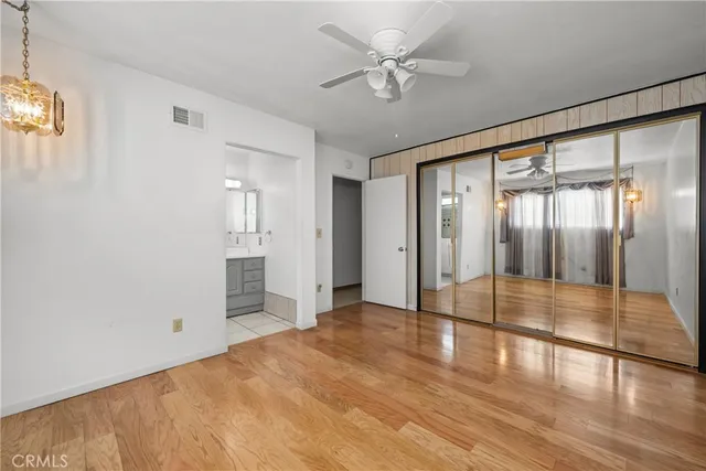 a view of an empty room with glass door