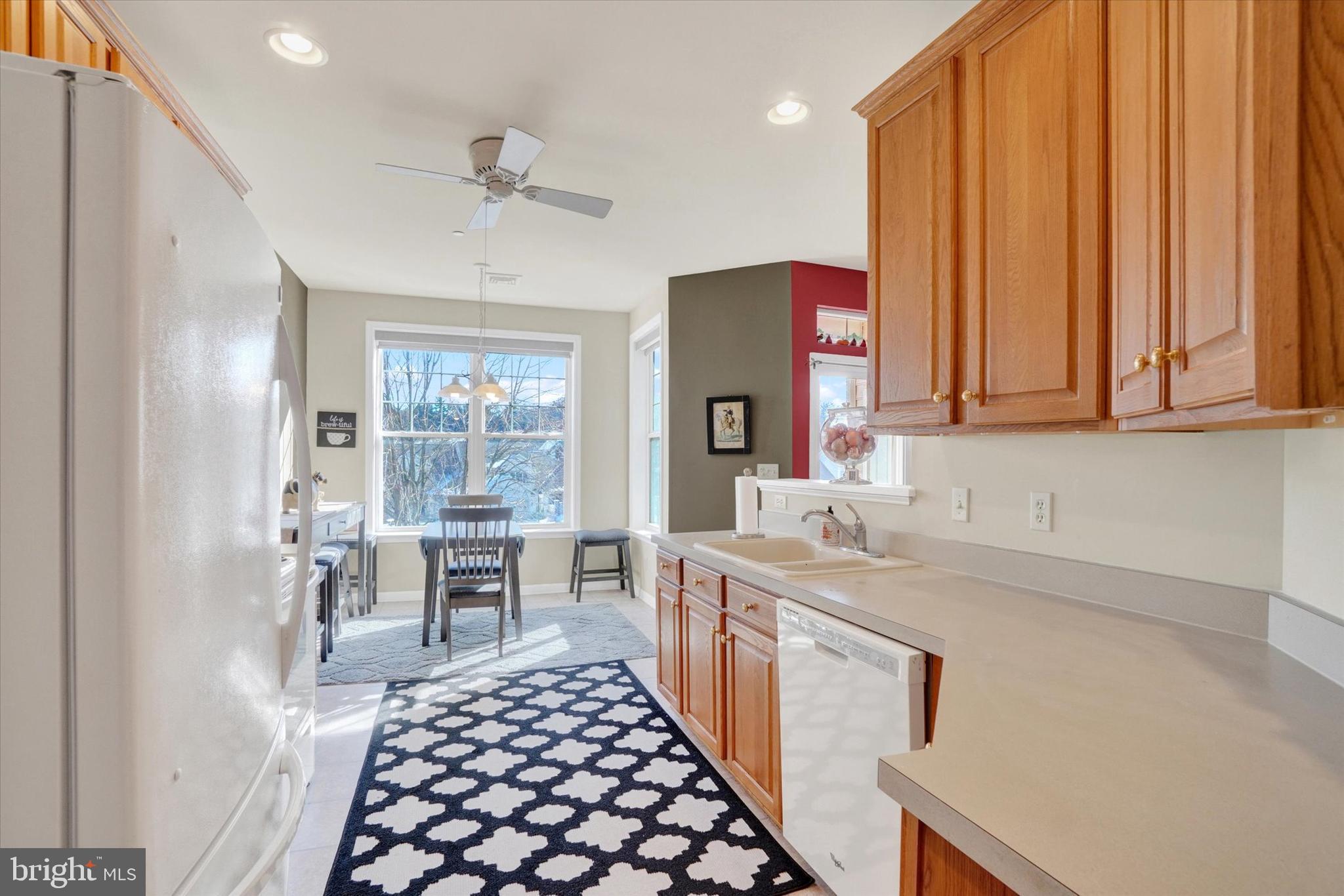1010 Crest Way, Unit 304 York, PA 17403 - Photo 5 of 22 a kitchen with a sink stove and cabinets