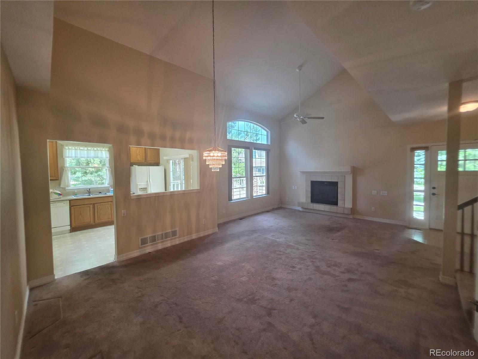 8911 Tappy Toorie Place Highlands Ranch, CO 80129 - Photo 20 of 28 a view of empty room with windows