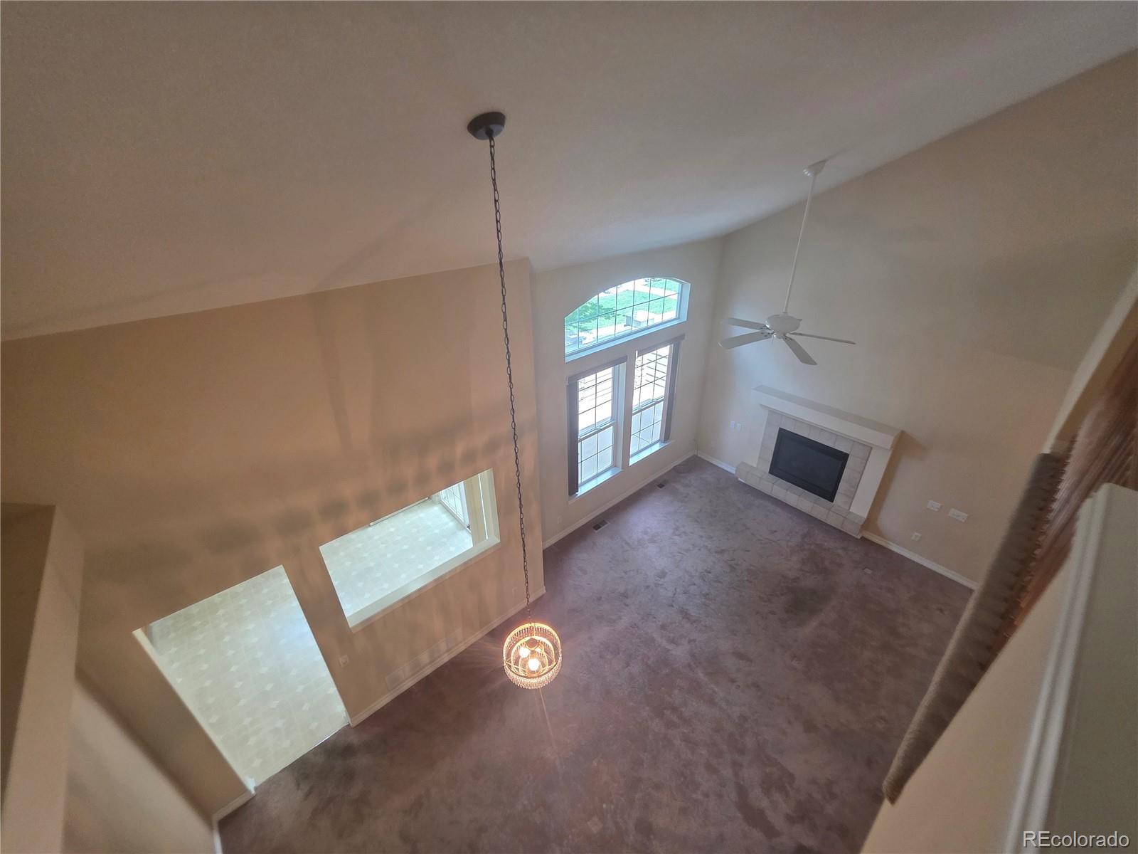 8911 Tappy Toorie Place Highlands Ranch, CO 80129 - Photo 27 of 28 a view of an empty room with windows