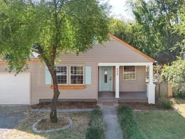 a front view of house with yard