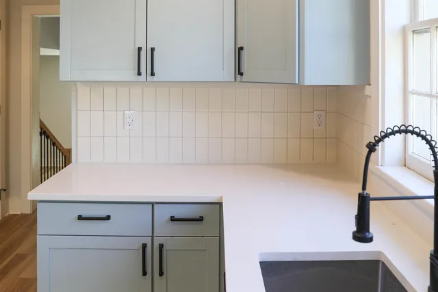 a view of storage and utility room with washer and dryer