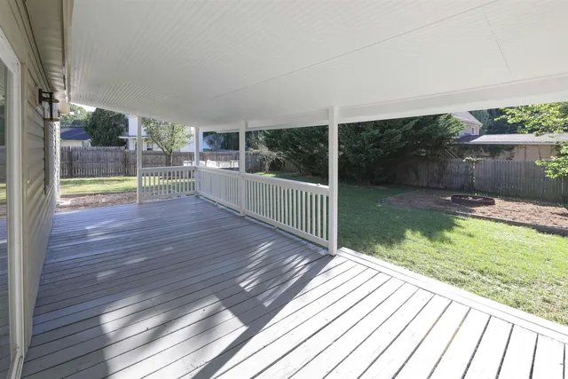 a view of swimming pool with seating space