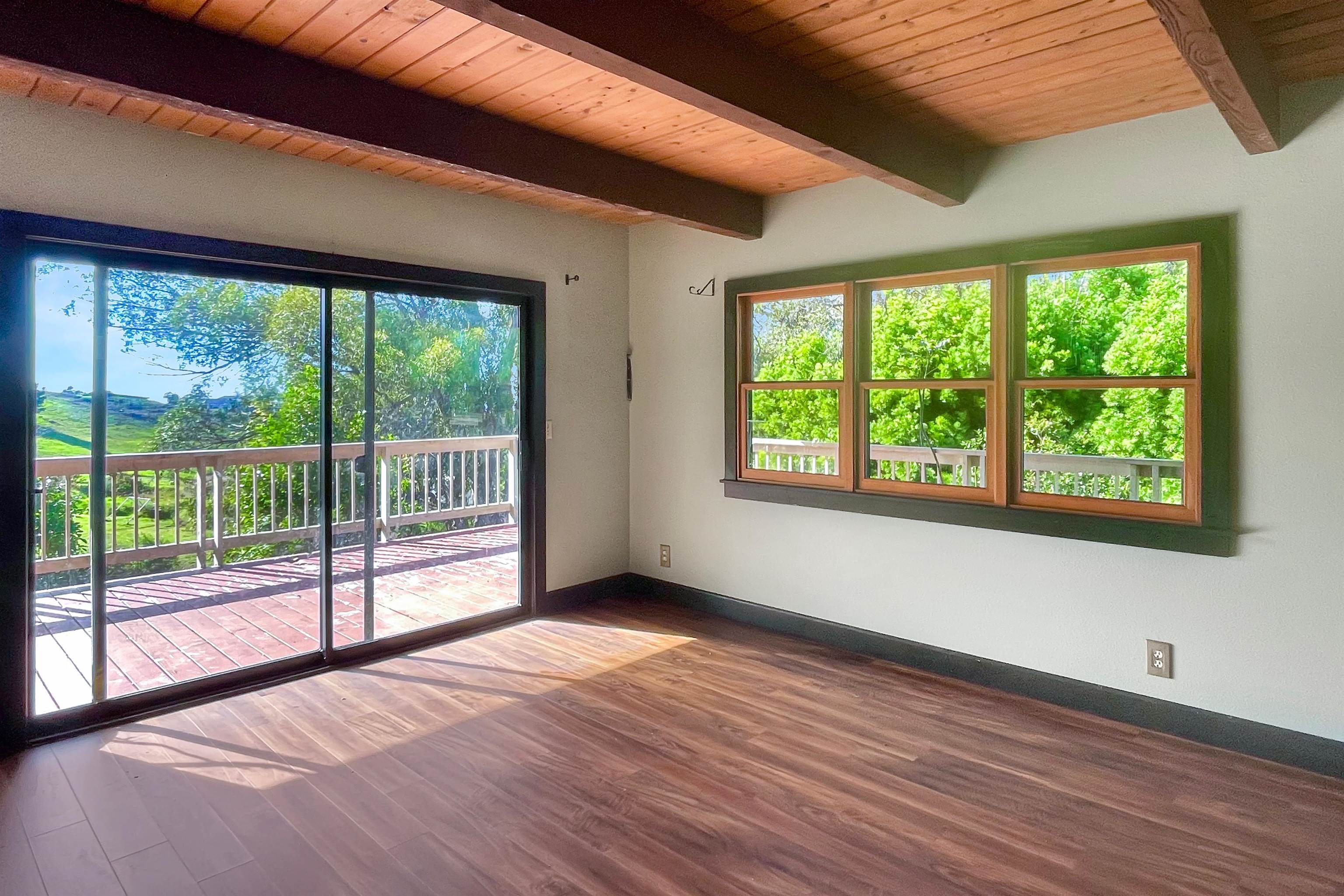 2400 Piiholo Road Makawao, HI 96768 - Photo 31 of 45 a view of empty room with wooden floor and fan