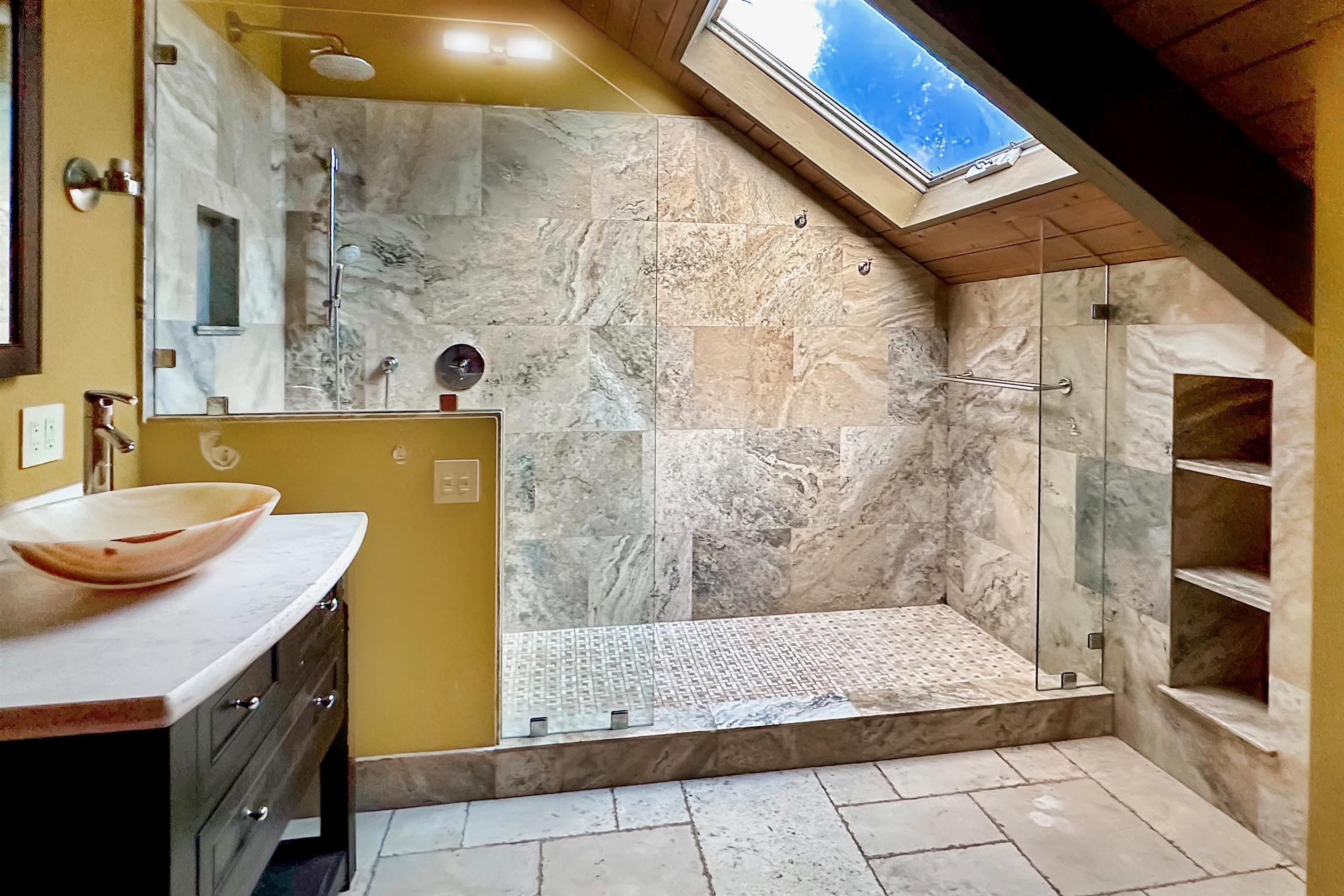 2400 Piiholo Road Makawao, HI 96768 - Photo 33 of 45 a bathroom with a sink and a mirror