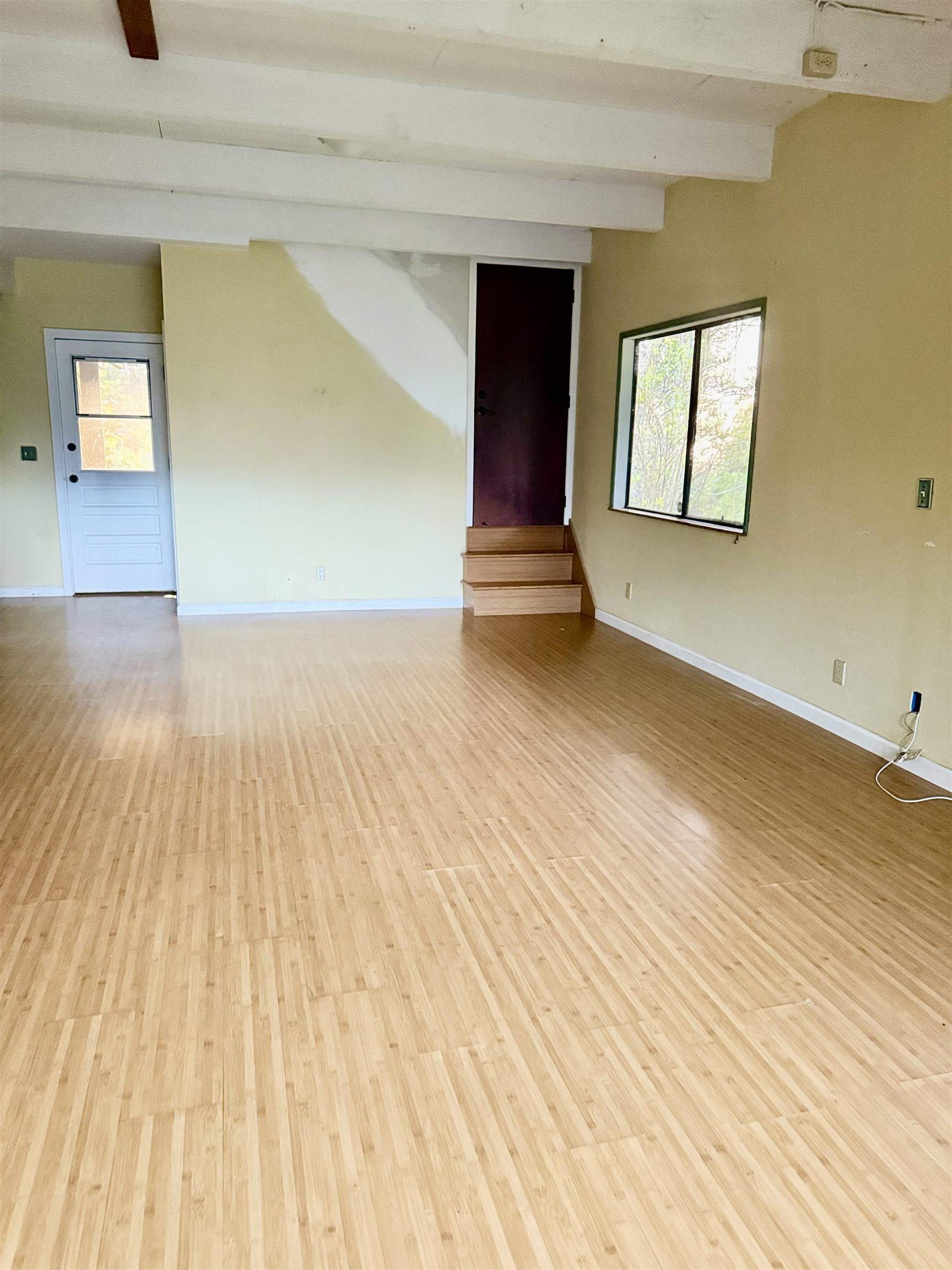 2400 Piiholo Road Makawao, HI 96768 - Photo 36 of 45 a view of empty room with wooden floor and fan