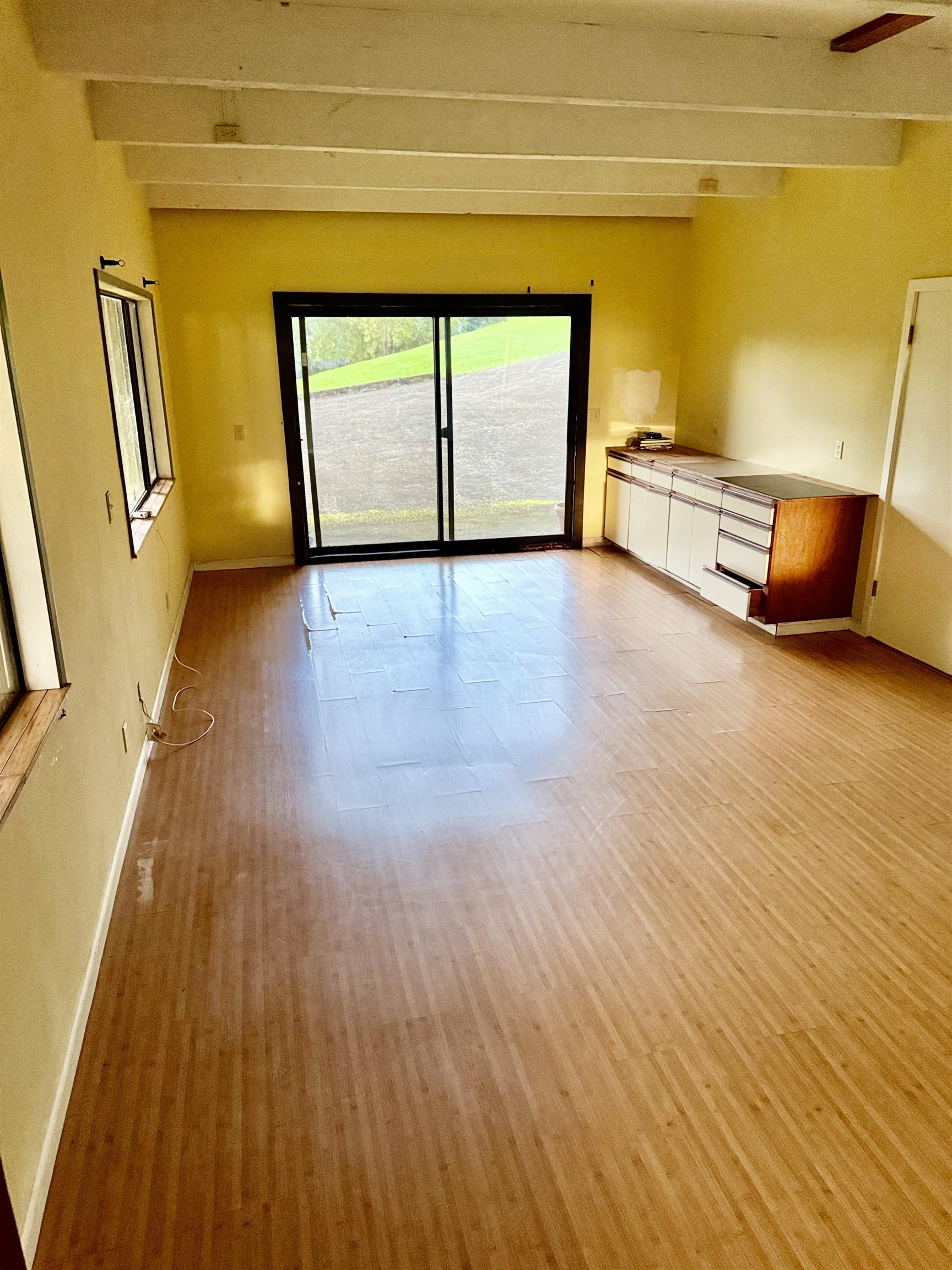 2400 Piiholo Road Makawao, HI 96768 - Photo 37 of 45 a view of empty room with wooden floor and fan