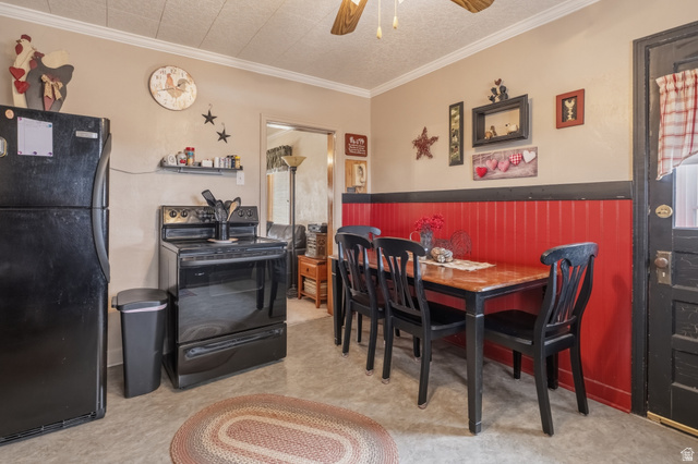82 South 100 West Lyman, UT 84749 - Photo 15 of 27 Dining space featuring ceiling fan and ornamental molding
