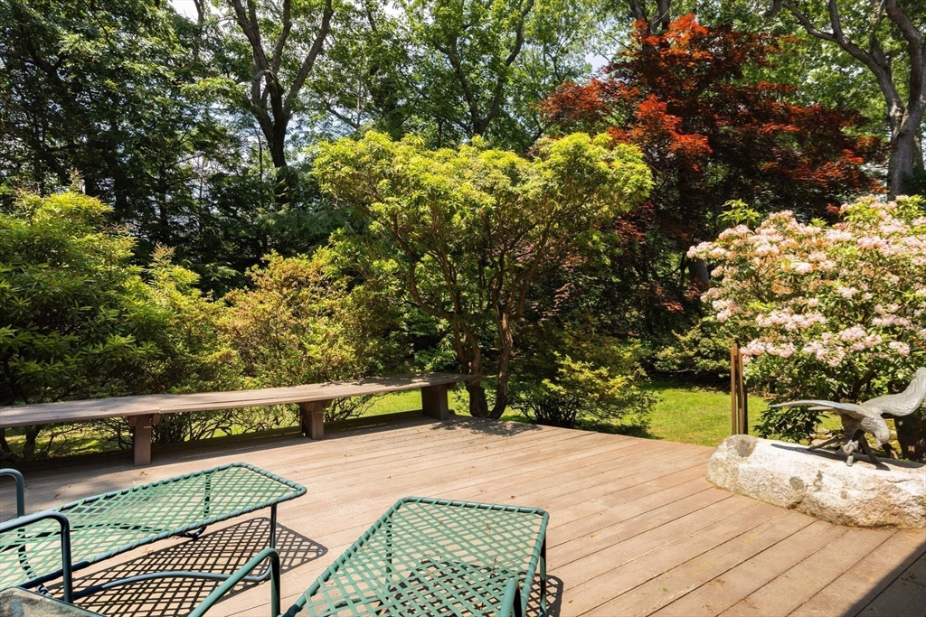 291 Goddard Avenue, Unit 291 Brookline, MA 02445 - Photo 18 of 19 a view of a balcony with two chairs and a table