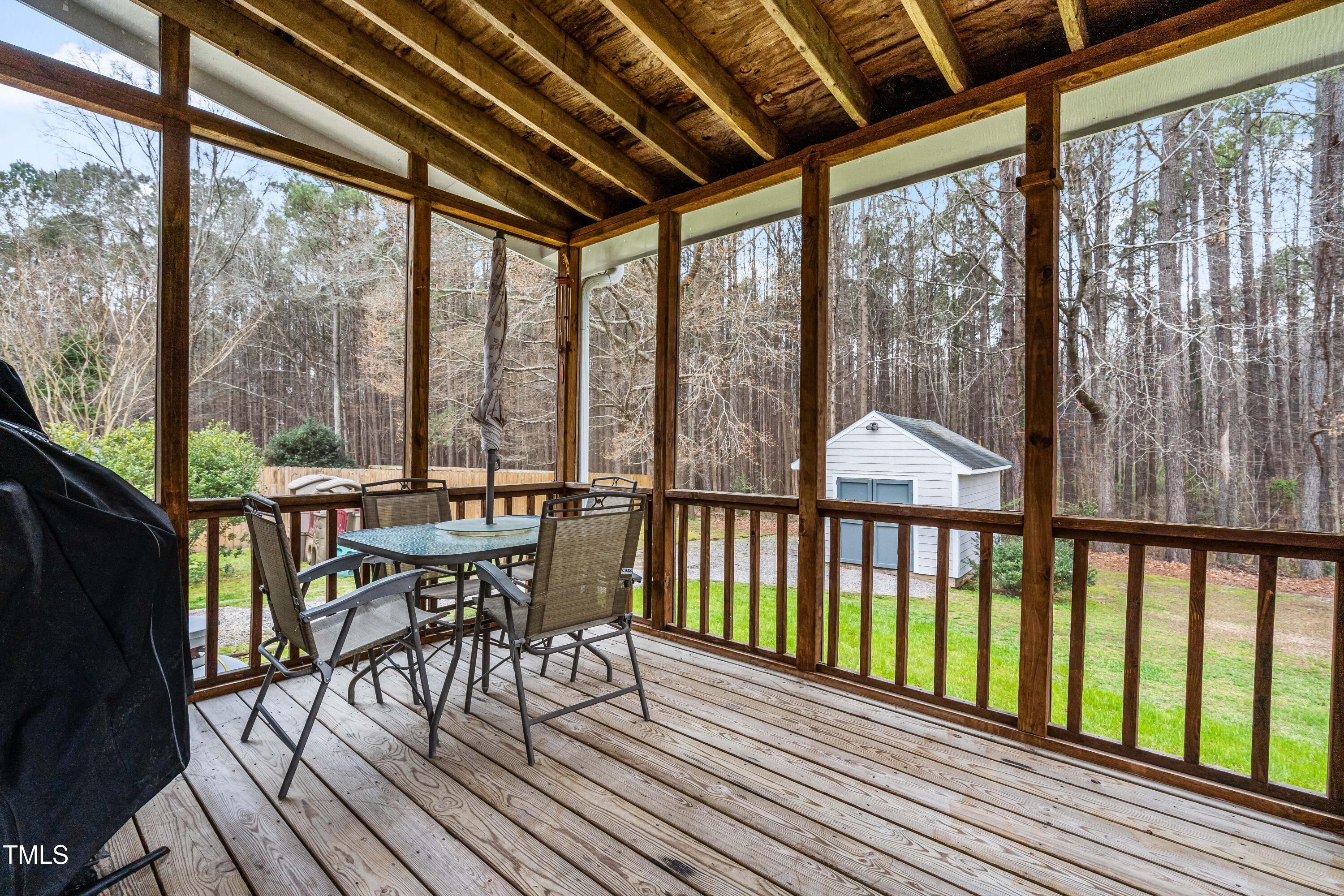 5216 Passenger Place Raleigh, NC 27603 - Photo 25 of 33 Screened porch view of lovely backyard~