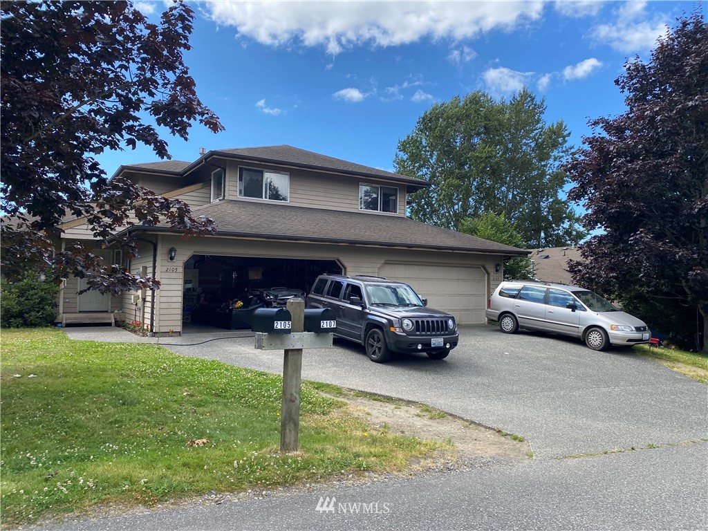 2105 Michigan Street Bellingham, WA 98229 - Photo 2 of 38 a car parked in front of the house