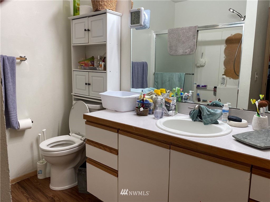 2105 Michigan Street Bellingham, WA 98229 - Photo 11 of 38 a bathroom with a sink toilet and shower