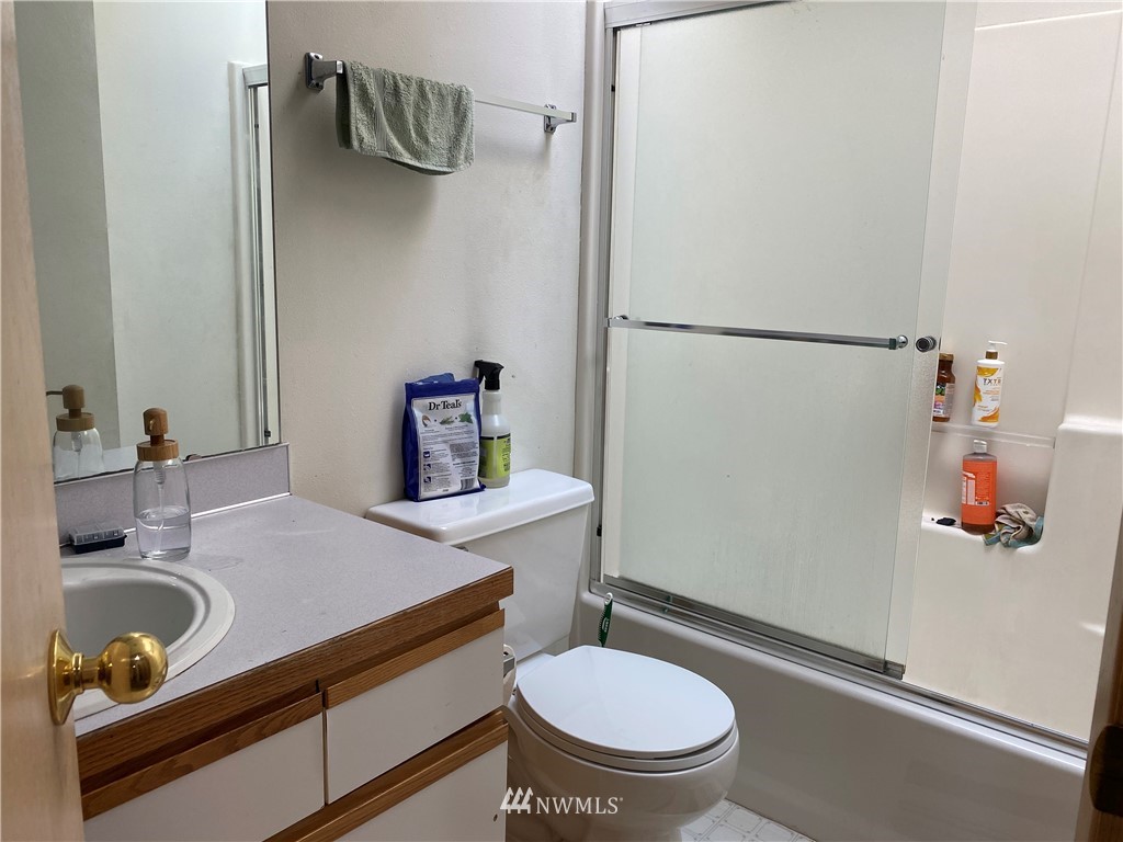 2105 Michigan Street Bellingham, WA 98229 - Photo 15 of 38 a bathroom with a sink toilet and shower