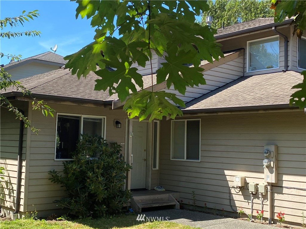 2105 Michigan Street Bellingham, WA 98229 - Photo 21 of 38 a front view of a house with plants