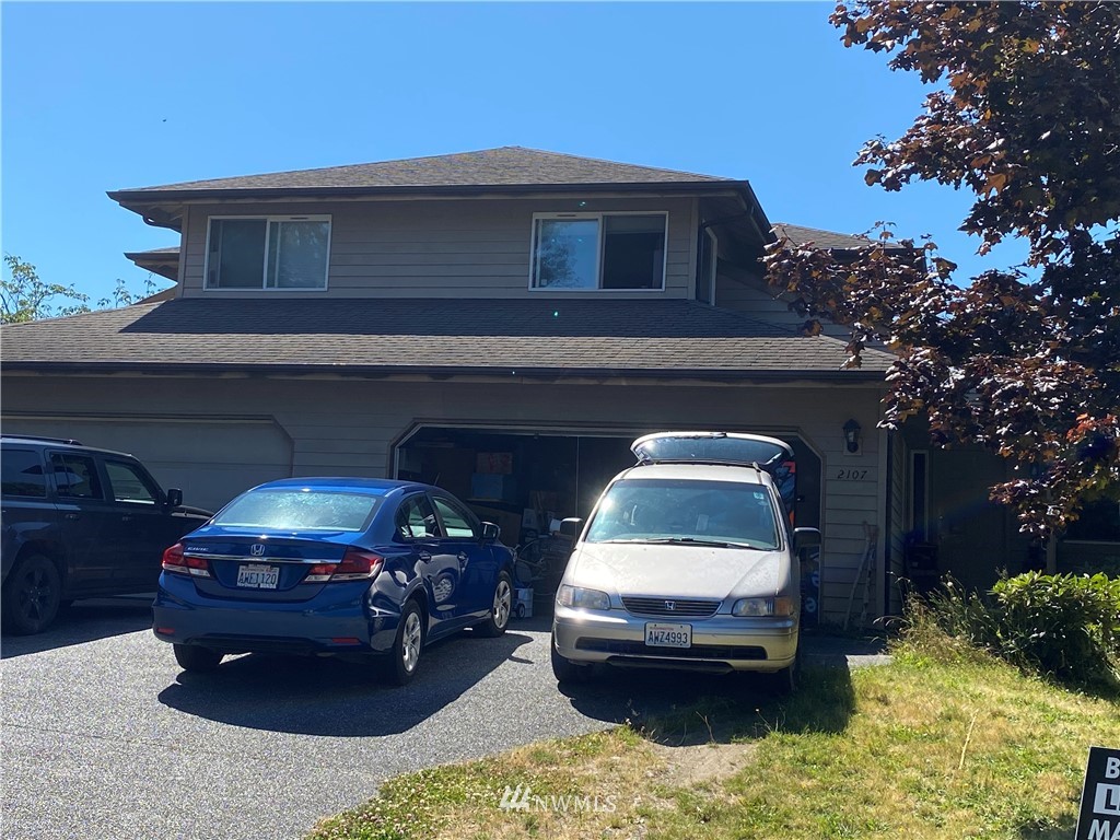 2105 Michigan Street Bellingham, WA 98229 - Photo 4 of 38 a car parked in front of a house