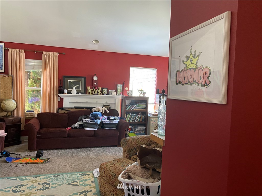 2105 Michigan Street Bellingham, WA 98229 - Photo 6 of 38 a living room with furniture and a large window