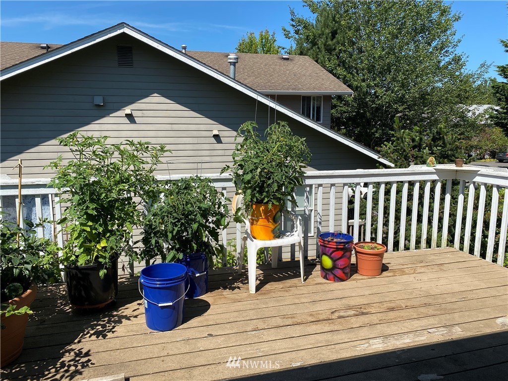 2105 Michigan Street Bellingham, WA 98229 - Photo 10 of 38 a terrace view with sitting space and trees