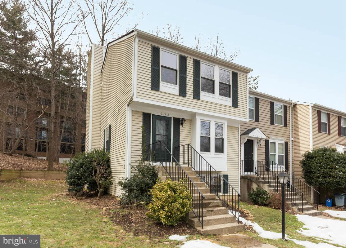 11052 Granby Court Reston, VA 20191 - Photo 2 of 28 a view of a house with a yard