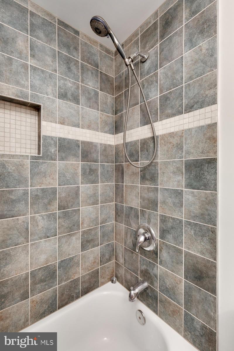 11052 Granby Court Reston, VA 20191 - Photo 13 of 28 a bathroom with a shower