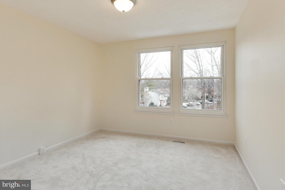 11052 Granby Court Reston, VA 20191 - Photo 17 of 28 an empty room with windows
