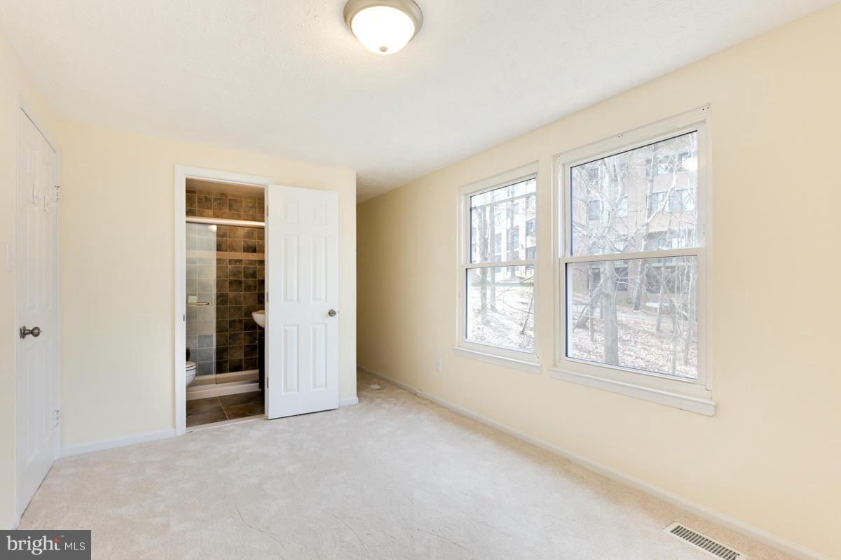 11052 Granby Court Reston, VA 20191 - Photo 6 of 28 an empty room with windows