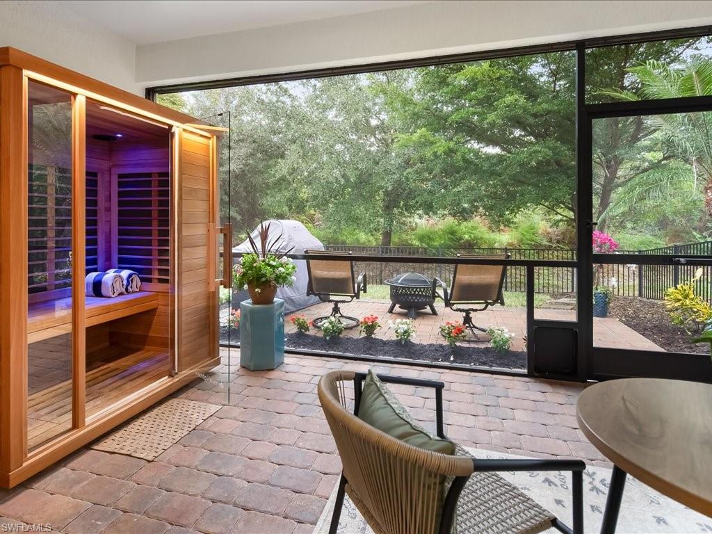 16242 Aberdeen Way Naples, FL 34110 - Photo 24 of 30 a dining room with furniture and window
