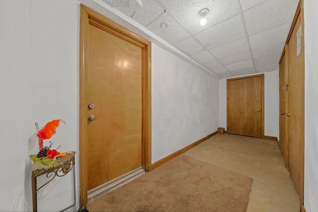 a backyard of a house with outdoor seating