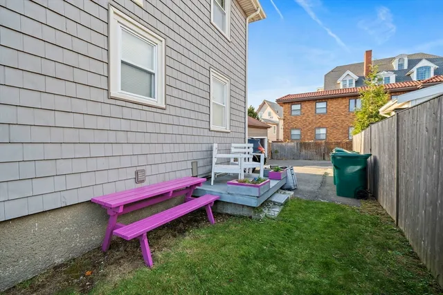 a car parked in front of a house