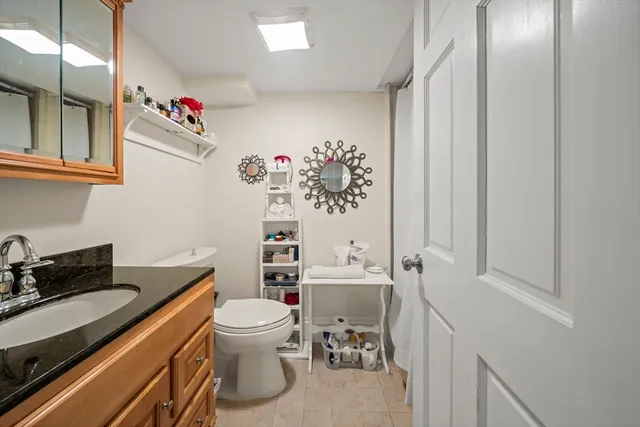 a room with a sink and a stove