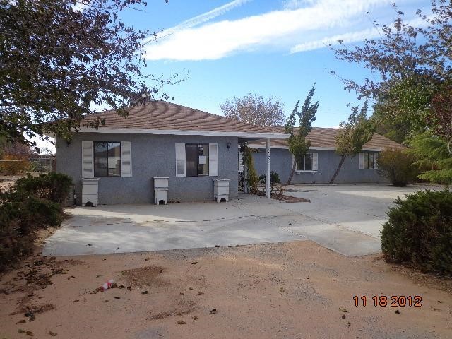 12698 Tesuque Road Apple Valley, CA 92308 - Photo 1 of 1 a view of a house with a patio