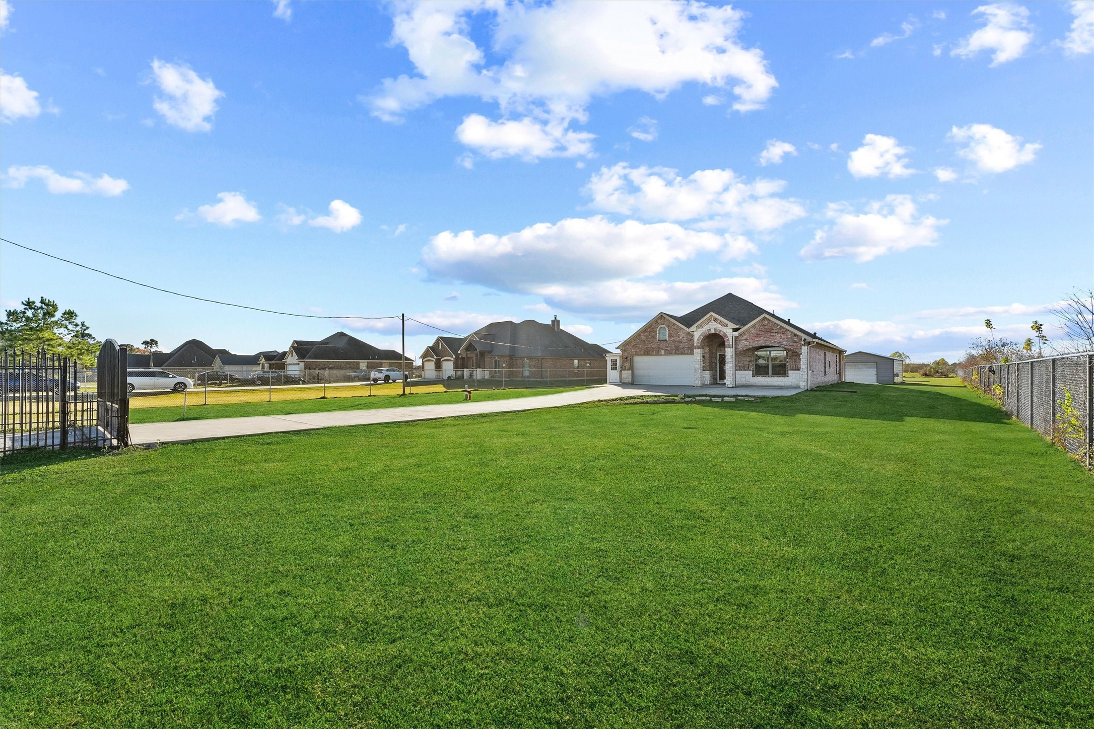 a view of a house with a big yard
