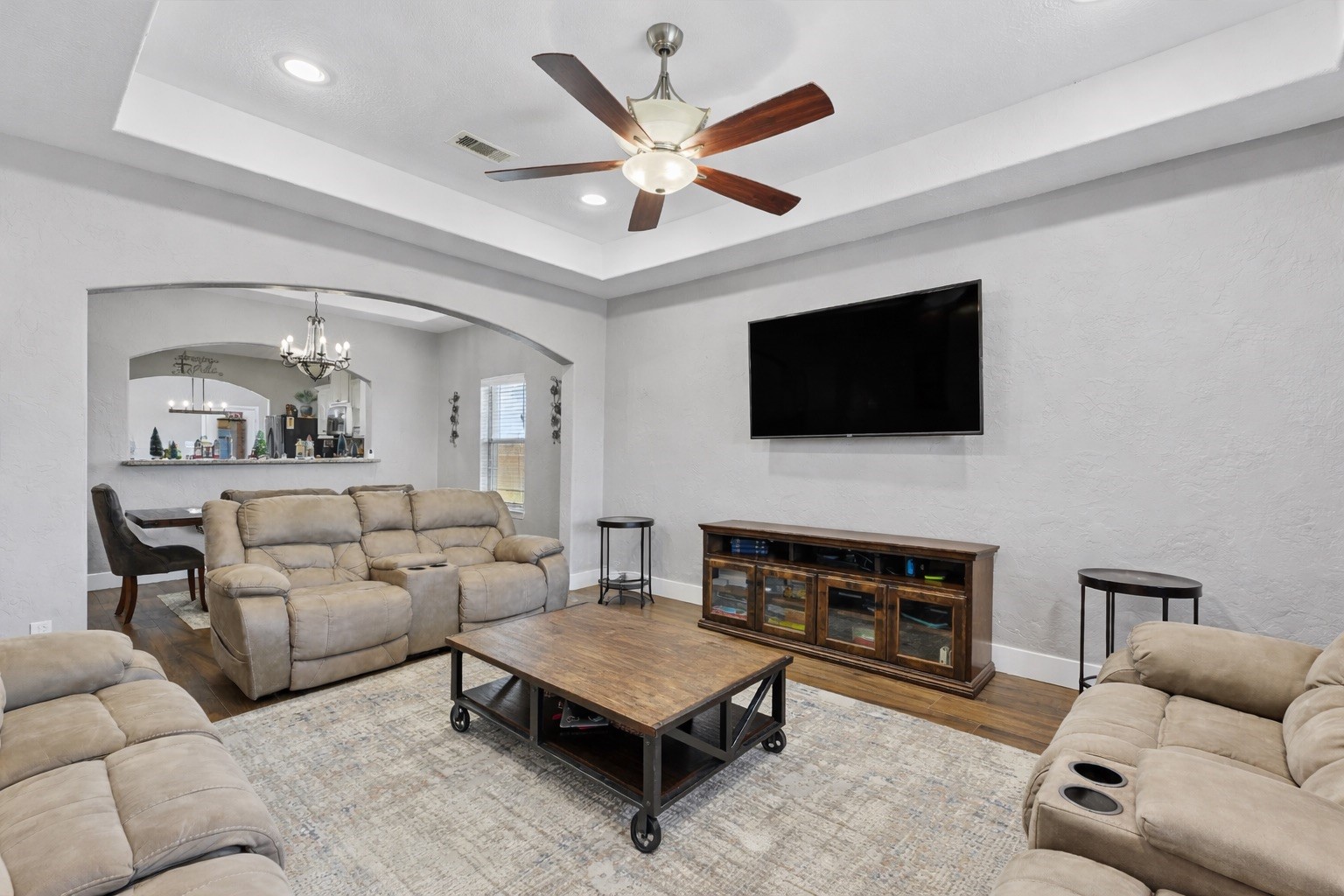19545 Crosby Eastgate Road Crosby, TX 77532 - Photo 9 of 26 a living room with furniture and a flat screen tv