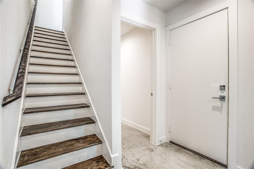 2180 Bennett Avenue, Unit 303 Dallas, TX 75206 - Photo 3 of 24 a view of a hallway with wooden floor and entryway