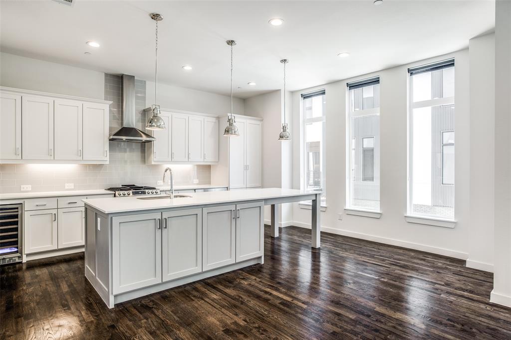 2180 Bennett Avenue, Unit 303 Dallas, TX 75206 - Photo 9 of 24 a kitchen with stainless steel appliances granite countertop a stove and a sink