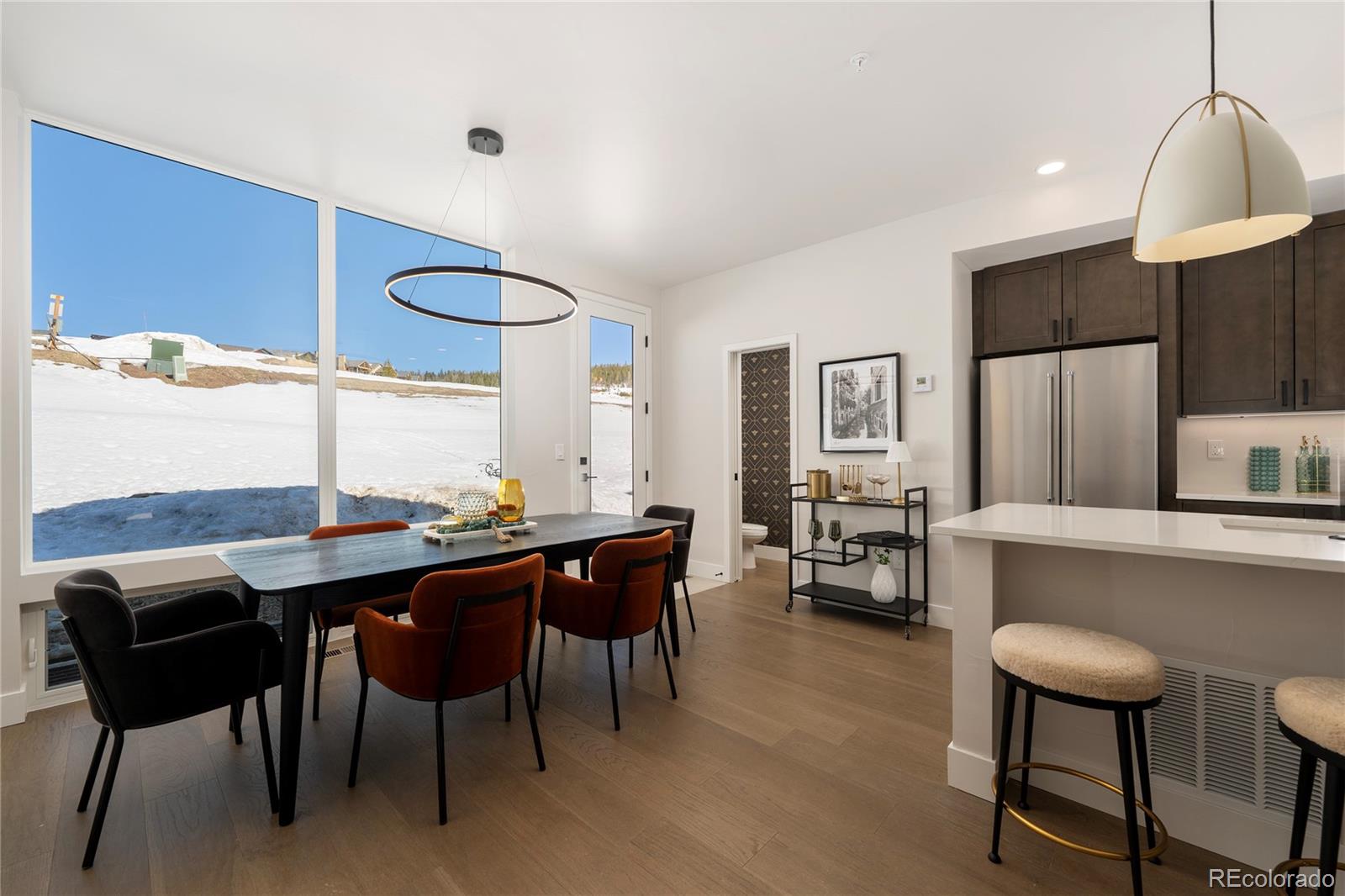 56 Wheeler Road Winter Park, CO 80482 - Photo 6 of 50 a kitchen with a table and chairs in it