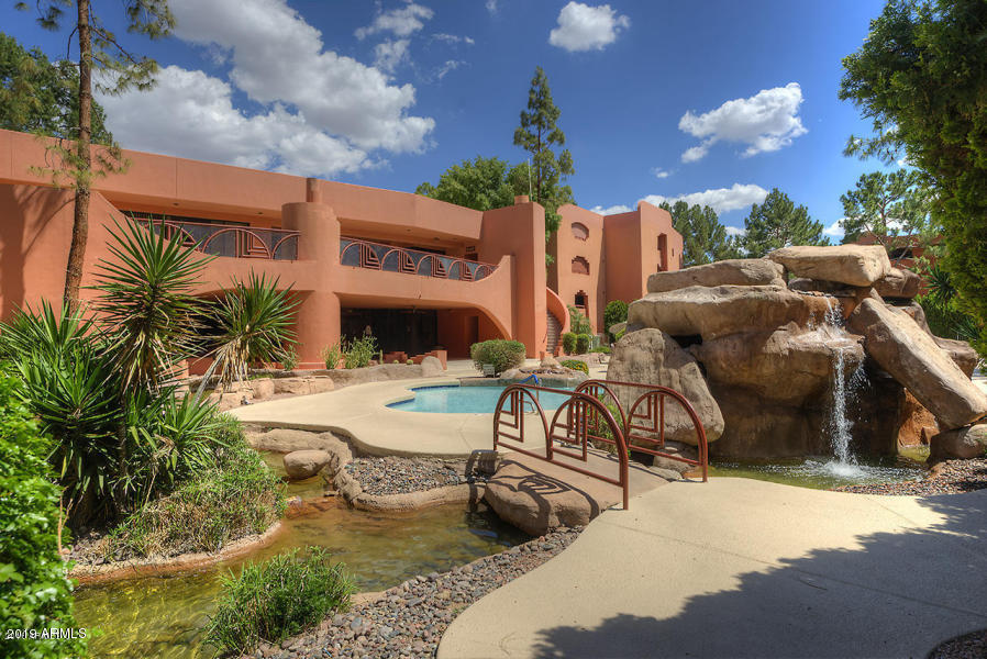 4303 East Cactus Road, Unit 116 Phoenix, AZ 85032 - Photo 27 of 35 a view of a house with backyard and sitting area