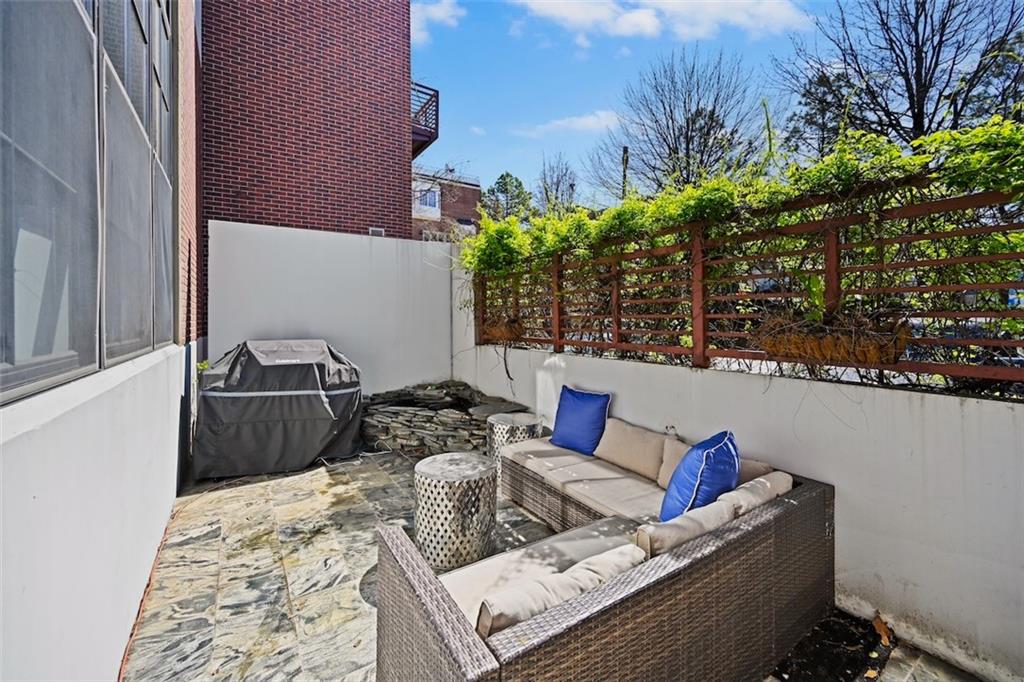 790 North Avenue Northeast, Unit 111 Atlanta, GA 30306 - Photo 25 of 41 a outdoor living room with furniture