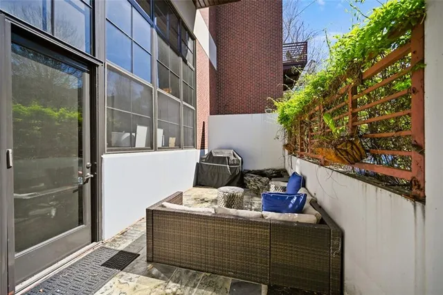 a view of balcony with chairs