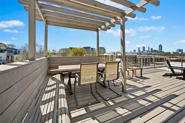 a view of a terrace with sitting area
