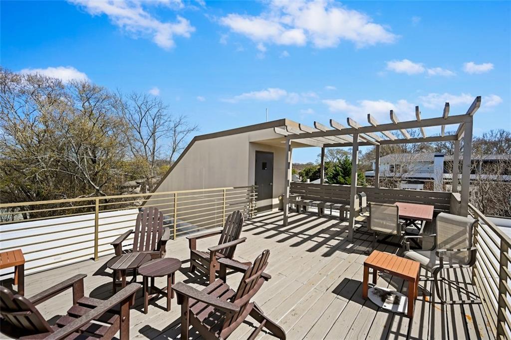 790 North Avenue Northeast, Unit 111 Atlanta, GA 30306 - Photo 31 of 41 a view of a terrace with sitting area