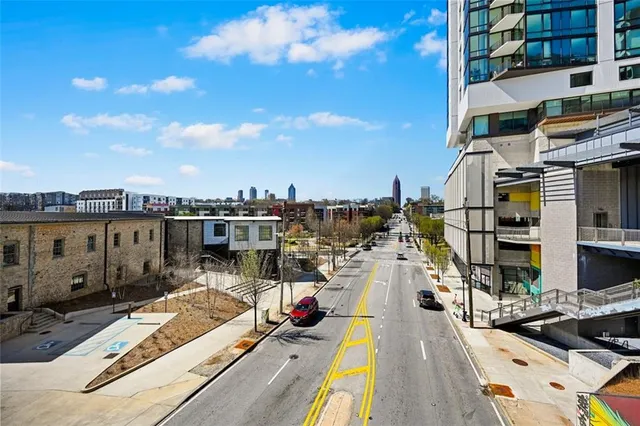 a view of a street with cars