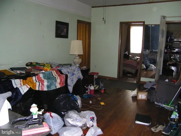 a bed room with furniture and a window