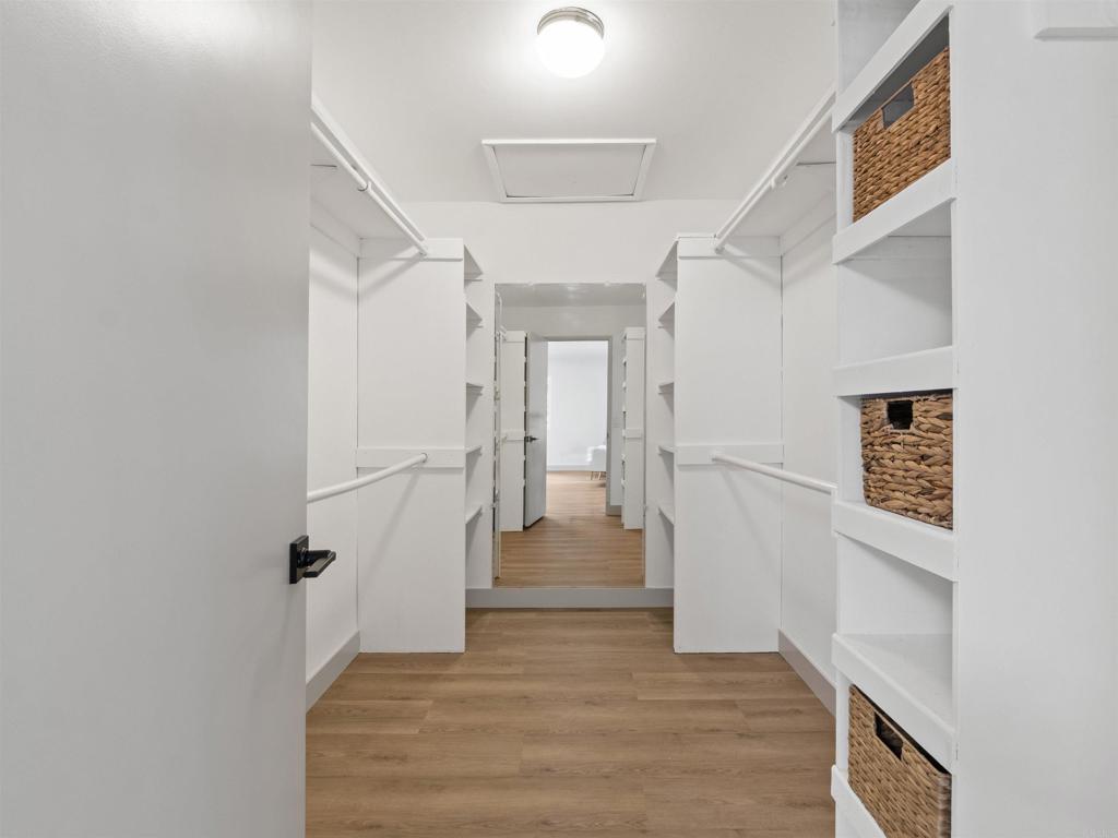 13737 Temple Street Poway, CA 92064 - Photo 22 of 38 a view of entryway and hall with wooden floor