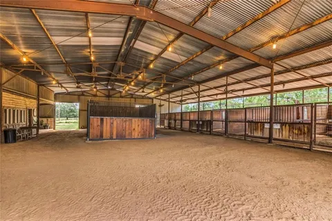 a view of a door with a chair and table