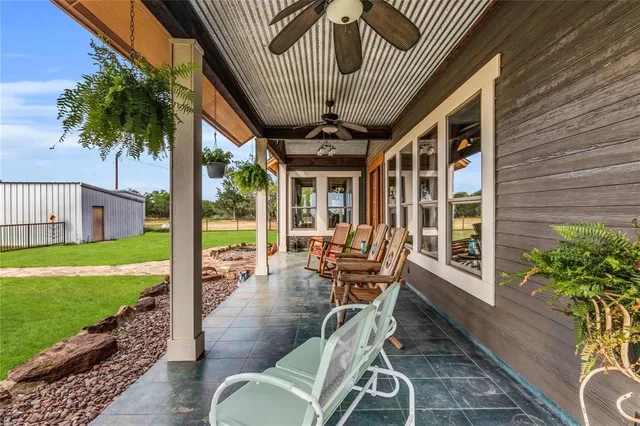 an aerial view of a house with porch
